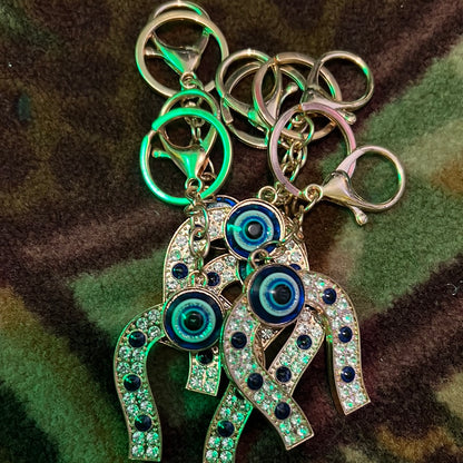 Evil eye horse shoe ￼ Keychain